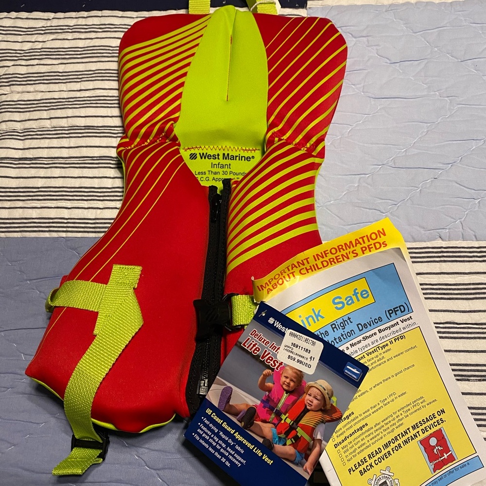 NWT! Brand New with tags. Infant life vest. USCG Approved.